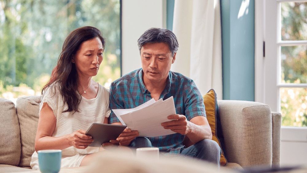 Photo of couple reviewing paperwork